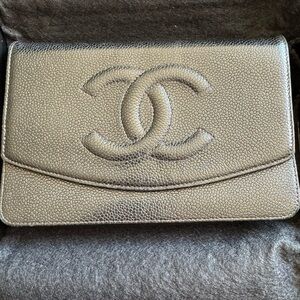 Chanel black caviar leather wallet on gold chain